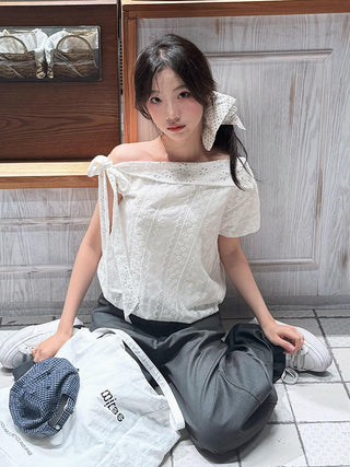 white embroidered shirt