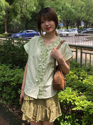 green lace shirt