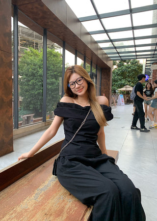 black off-shoulder suit