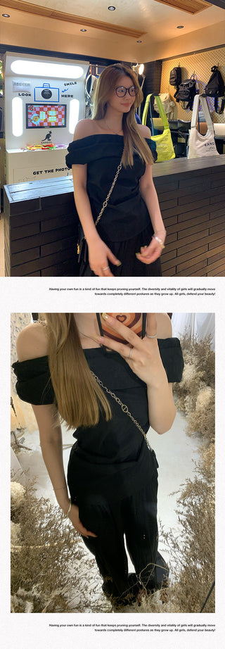 black off-shoulder suit