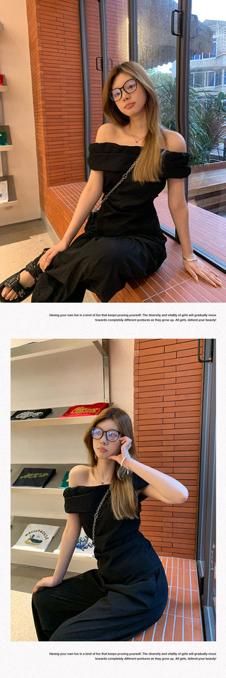 black off-shoulder suit