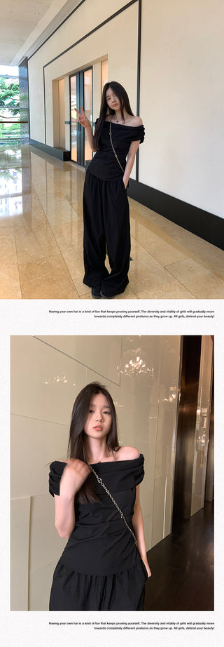 black off-shoulder suit