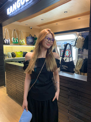 black off-shoulder suit