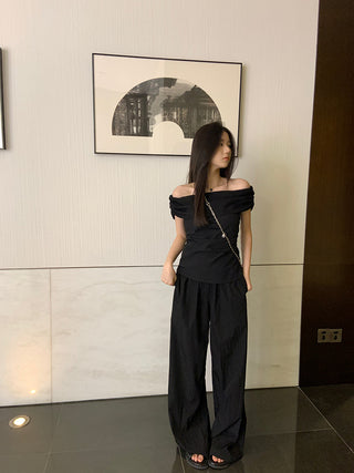 black off-shoulder suit