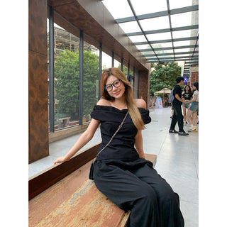 black off-shoulder suit
