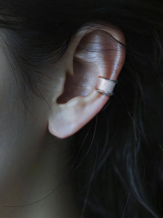 earless tide clip earrings