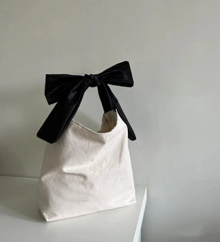 Bow shoulder bag