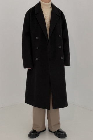 Double-breasted mid-length woolen coat