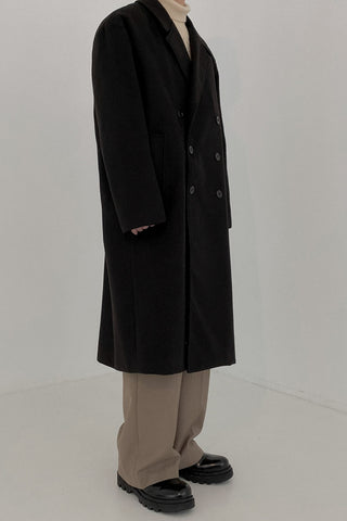Double-breasted mid-length woolen coat