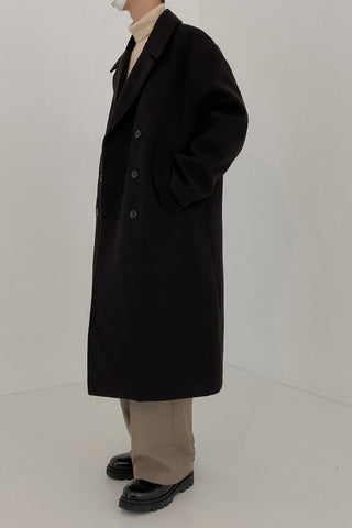 Double-breasted mid-length woolen coat