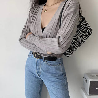 Loose deep v-neck long-sleeve knitted cardigan